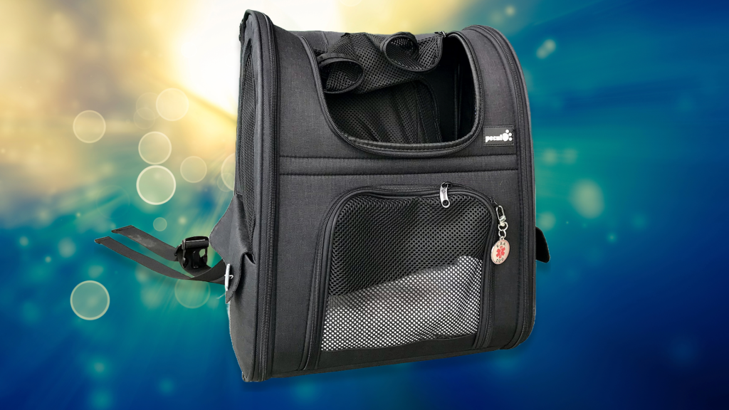 Detailed view of the pecute dog carrier backpack showing its front openings and breathable fabric.